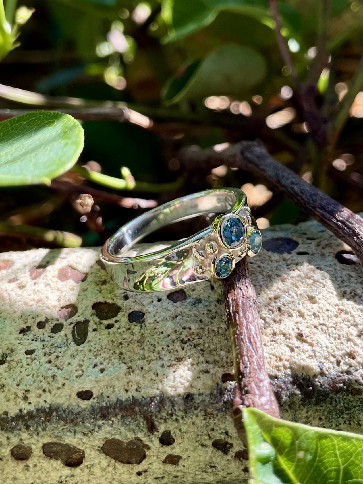 Sterling Silver, 9c yellow Gold Blue Topaz ring