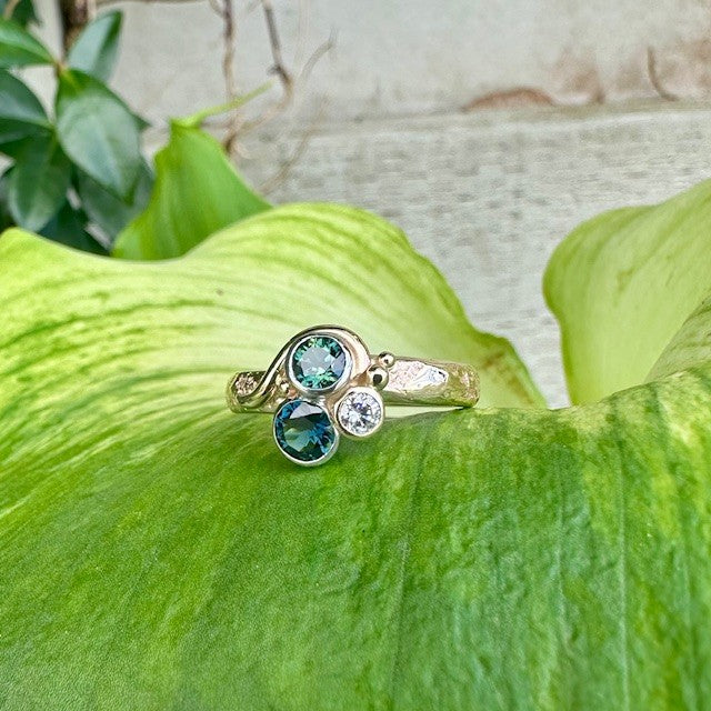 9ct Yellow and white gold Sapphire and diamond sandcast ring