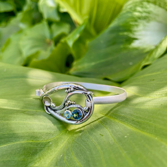 Sterling Silver and 9ct yellow gold London Blue, Swiss Blue Topaz hinged Bangle