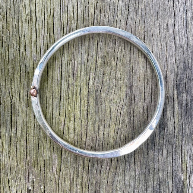 Sterling Silver and 9ct Yellow gold round/ hammered bangle