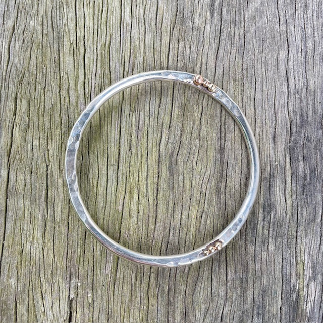 Sterling Silver and 9ct Yellow gold round/ hammered bangle