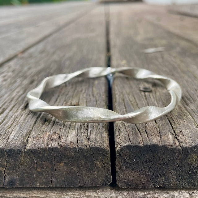 Sterling Silver flat twist bangle with brushed finish