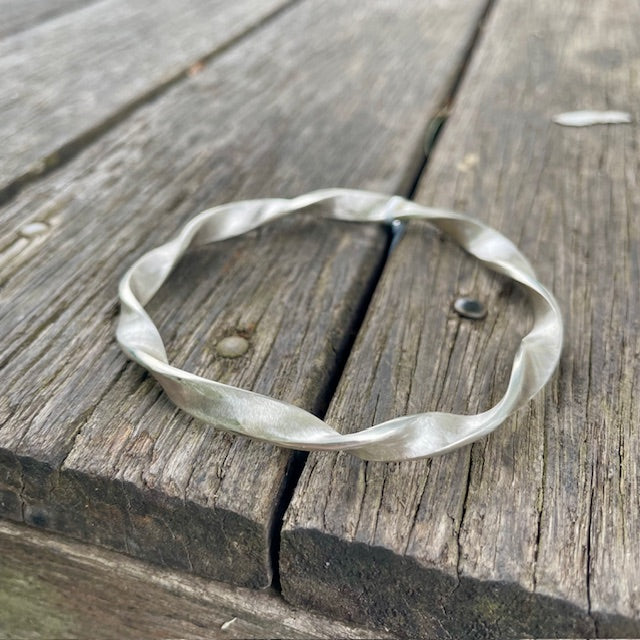Sterling Silver flat twist bangle with brushed finish