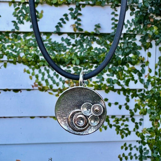 Sterling Silver and 9ct Rose gold disk pendant 