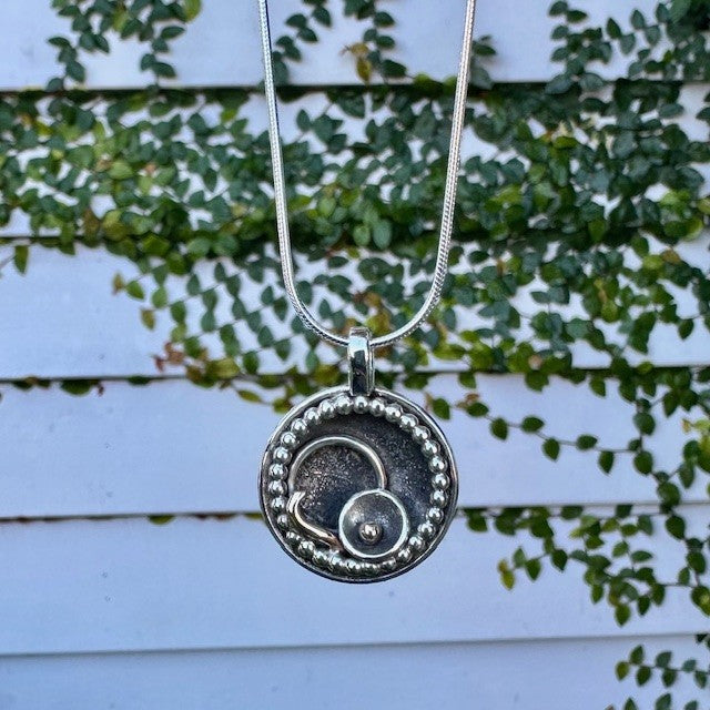 Sterling Silver and 9ct Yellow gold disk pendant