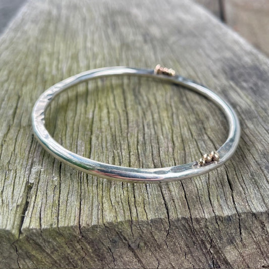 Sterling Silver and 9ct Yellow gold round/ hammered bangle 
