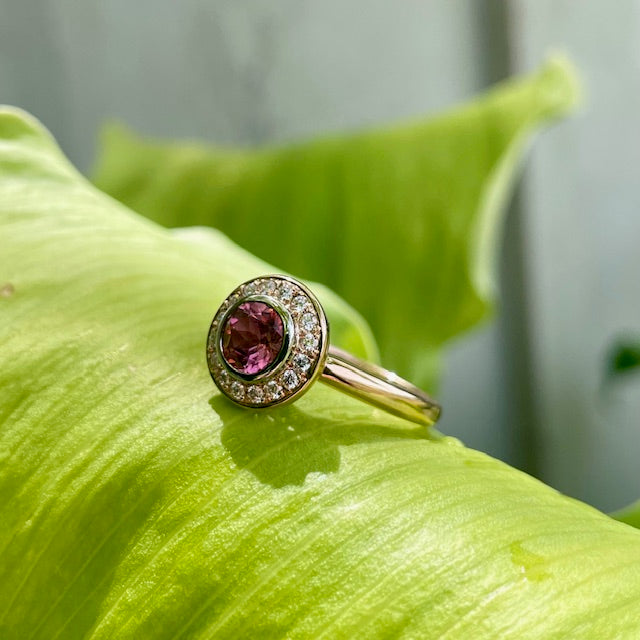 9CT Rose and White gold Pink Tourmaline and Diamond halo ring